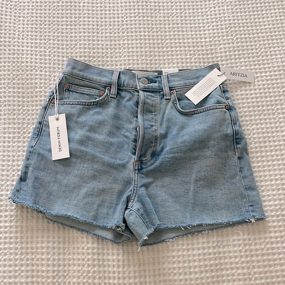 Light denim shorts, button front.